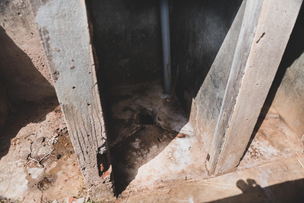 Interior of a dilapidated latrine