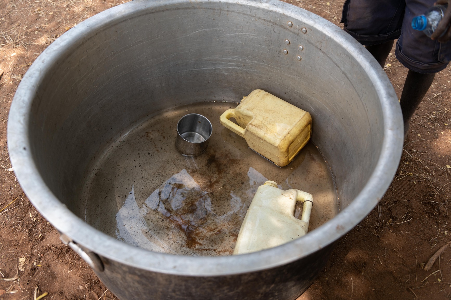 A big sauce pan used for water collection